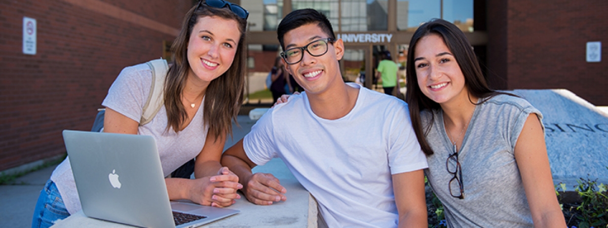 Students outside front doors