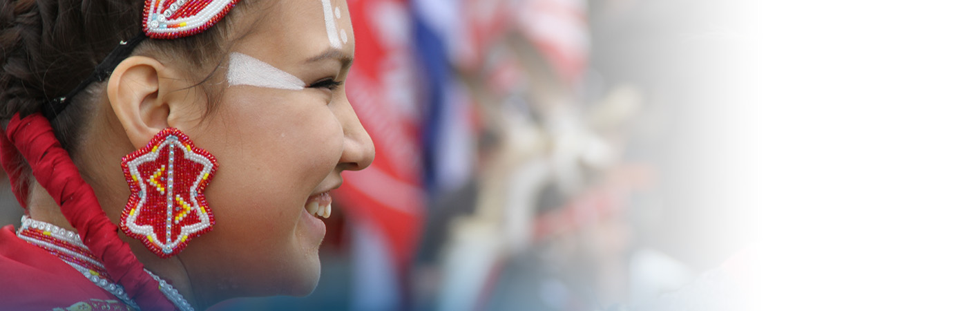 Photo of Indigenous woman at powwow