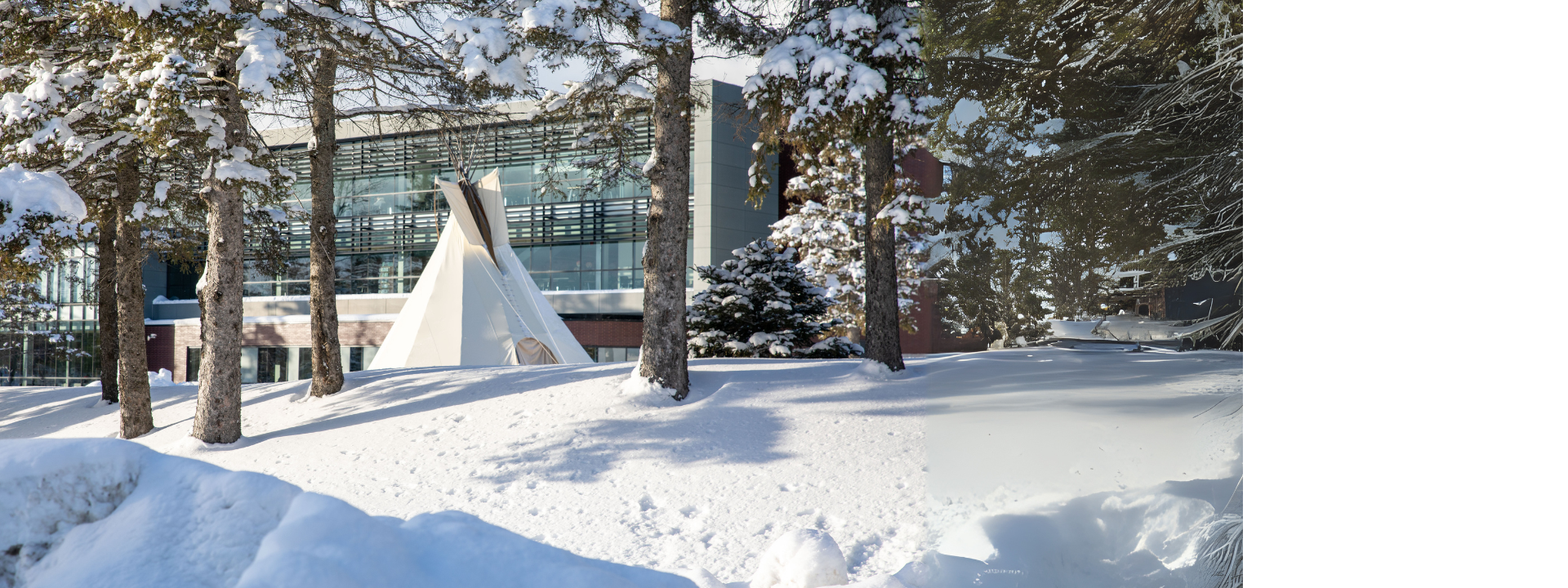 A picture of the Tipi with snow around 