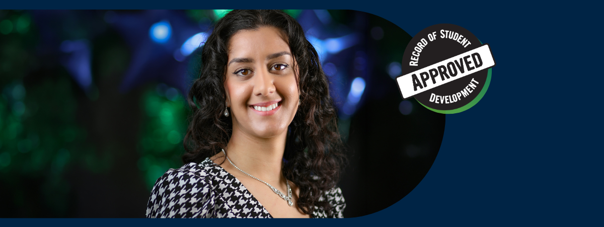 Headshot of Roshni smiling into the camera