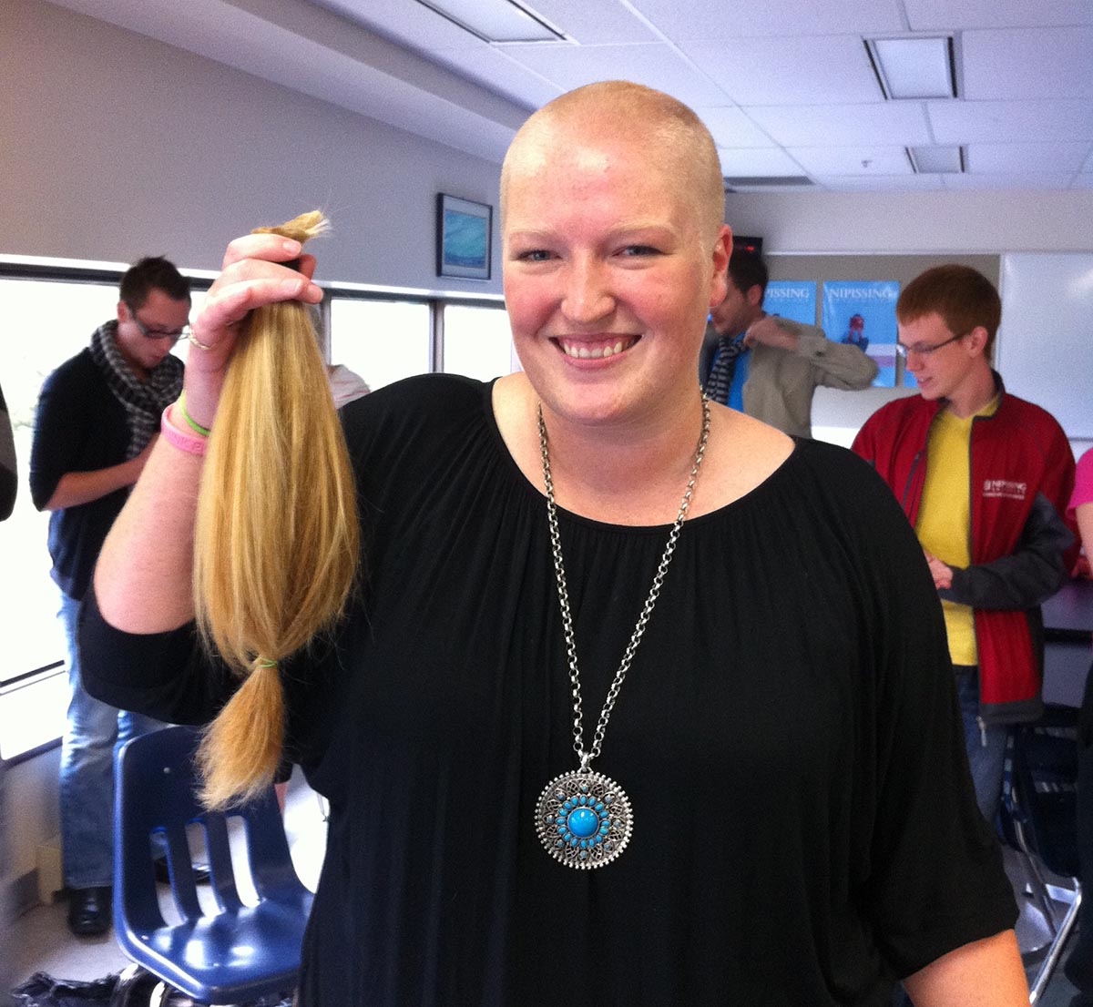 Genevieve shaves head for charity