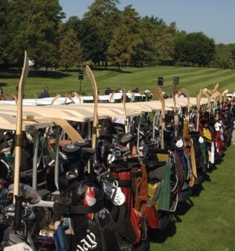 Photo of golf carts full of hockey gear