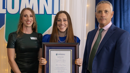 Mabel Plourde-Doran receives the Distinguished Alumni Achievement Award