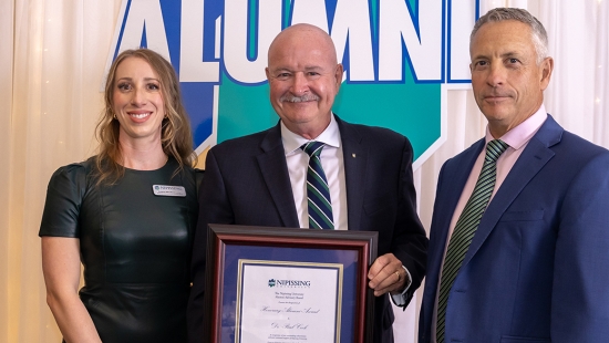 Dr. Paul Cook receives the Honorary Alumni Award