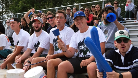 Student and alumni fans cheering on the Lakers during Homecoming weekend