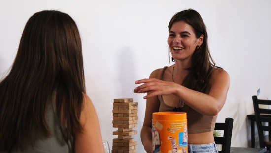 Lakers students and alumni playing board games