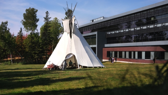 Kicking off Homecoming weekend with a bonfire in the Library Teepee