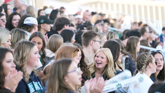 Crowd socializing during NU Homecoming 2025 games