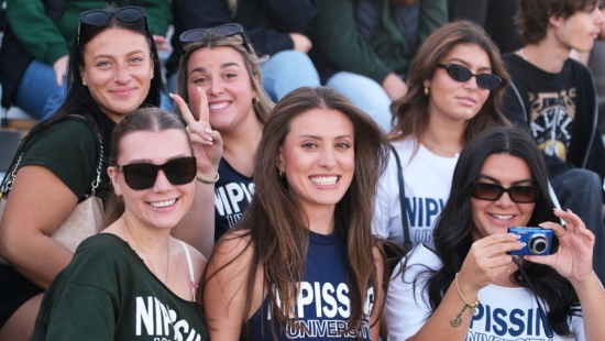 Lakers posing for a photo during NU Homecoming 2025