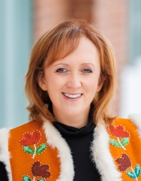 Erin Reid in front of a background