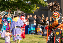 Dancers in regalia at the Nipissing and Canadore Welcome Back Pow Wow 